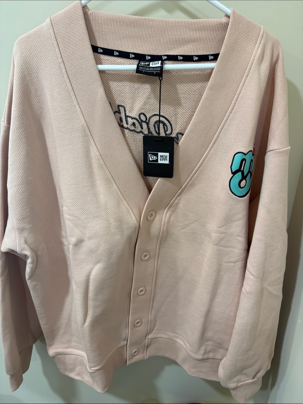 New Era Diablos Rojo de Mexico Women’s Pale Pink Button Cardigan with Teal Patch